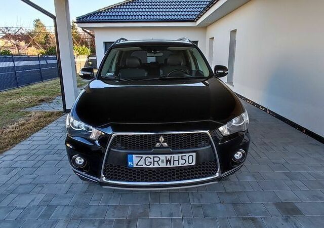 Черный Мицубиси Аутлендер, объемом двигателя 2 л и пробегом 264 тыс. км за 2900 $, фото 1 на Automoto.ua