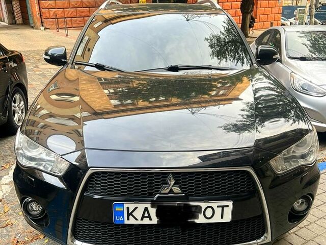 Мицубиси Аутлендер 2010 в Днепре (Днепропетровске) на Automoto.ua Черный Мицубиси Аутлендер, объемом двигателя 2 л и пробегом 303 тыс. км за 7200 $, фото 1 на Automoto.ua