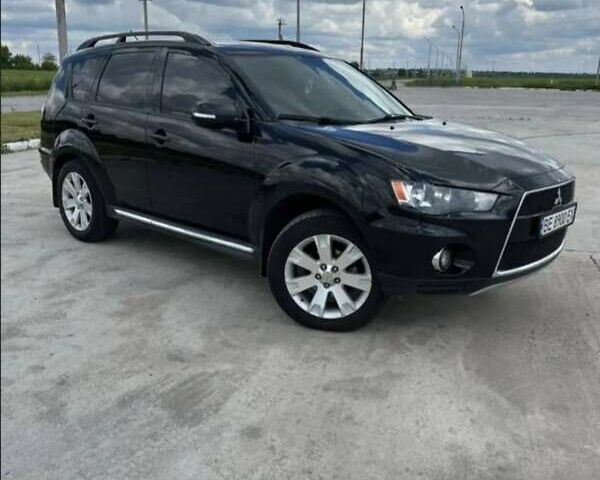 Чорний Міцубісі Аутлендер, об'ємом двигуна 2.4 л та пробігом 187 тис. км за 10200 $, фото 1 на Automoto.ua