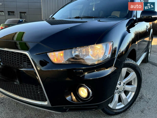 Черный Мицубиси Аутлендер, объемом двигателя 2.2 л и пробегом 263 тыс. км за 11300 $, фото 1 на Automoto.ua