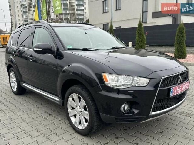 Черный Мицубиси Аутлендер, объемом двигателя 2.2 л и пробегом 226 тыс. км за 10750 $, фото 1 на Automoto.ua