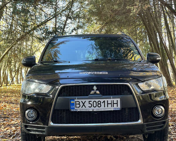 Міцубісі Аутлендер 2011 у Хмельницькому на Automoto.ua Чорний Міцубісі Аутлендер, об'ємом двигуна 2 л та пробігом 196 тис. км за 9500 $, фото 1 на Automoto.ua