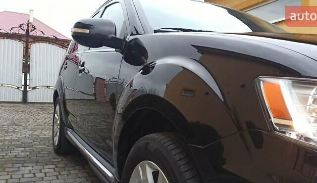 Черный Мицубиси Аутлендер, объемом двигателя 2.2 л и пробегом 209 тыс. км за 12700 $, фото 1 на Automoto.ua