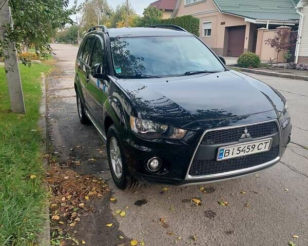 Чорний Міцубісі Аутлендер, об'ємом двигуна 2.3 л та пробігом 271 тис. км за 10500 $, фото 1 на Automoto.ua