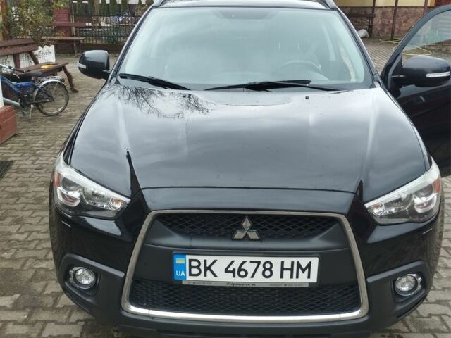 Міцубісі Аутлендер 2012 у Костополе на Automoto.ua Чорний Міцубісі Аутлендер, об'ємом двигуна 1.8 л та пробігом 248 тис. км за 10500 $, фото 1 на Automoto.ua