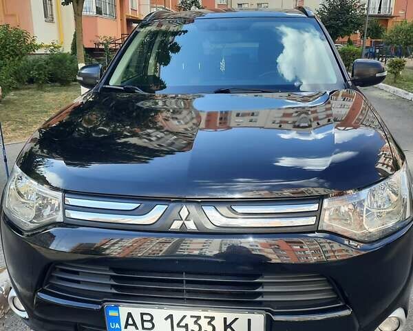 Черный Мицубиси Аутлендер, объемом двигателя 2.27 л и пробегом 256 тыс. км за 13600 $, фото 1 на Automoto.ua