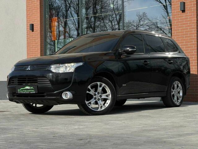 Чорний Міцубісі Аутлендер, об'ємом двигуна 2.4 л та пробігом 212 тис. км за 11490 $, фото 1 на Automoto.ua