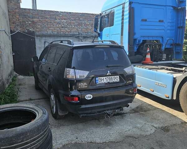 Чорний Міцубісі Аутлендер, об'ємом двигуна 2.36 л та пробігом 164 тис. км за 10800 $, фото 1 на Automoto.ua