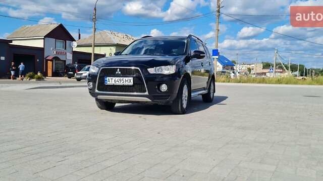 Черный Мицубиси Аутлендер, объемом двигателя 2.27 л и пробегом 195 тыс. км за 10500 $, фото 1 на Automoto.ua