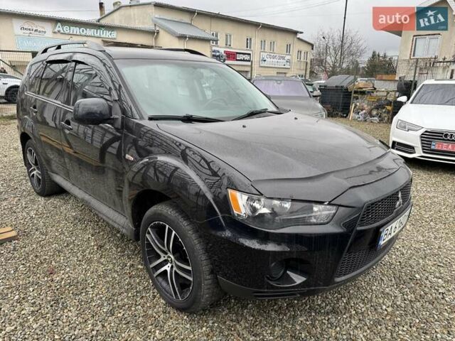 Чорний Міцубісі Аутлендер, об'ємом двигуна 2.36 л та пробігом 210 тис. км за 10500 $, фото 1 на Automoto.ua