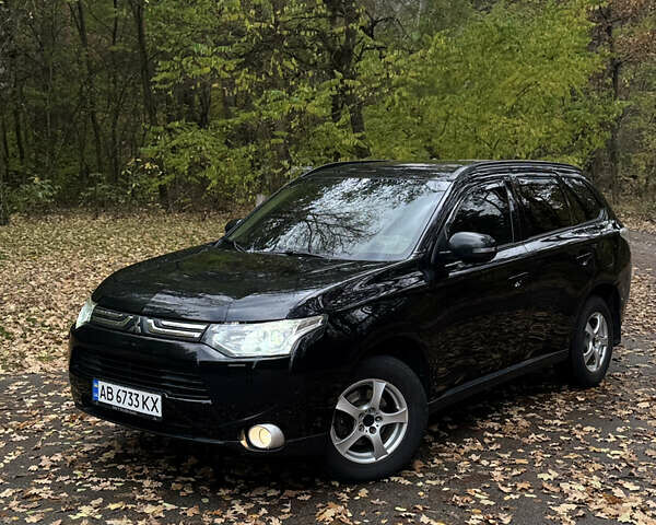 Міцубісі Аутлендер 2013 у Броварах на Automoto.ua Чорний Міцубісі Аутлендер, об'ємом двигуна 2.36 л та пробігом 168 тис. км за 11700 $, фото 1 на Automoto.ua