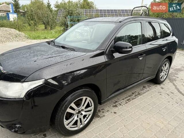 Чорний Міцубісі Аутлендер, об'ємом двигуна 2.27 л та пробігом 150 тис. км за 12500 $, фото 1 на Automoto.ua
