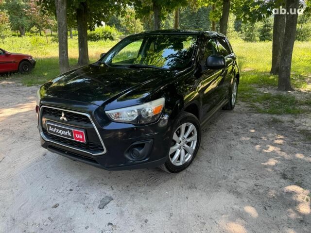 Черный Мицубиси Аутлендер, объемом двигателя 2 л и пробегом 195 тыс. км за 9990 $, фото 1 на Automoto.ua