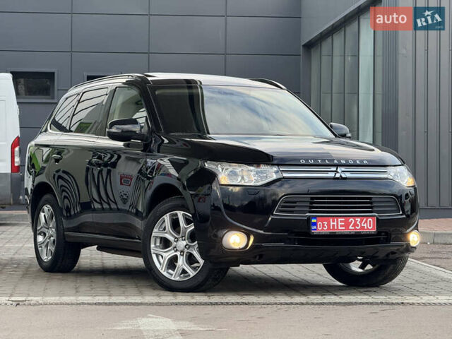 Чорний Міцубісі Аутлендер, об'ємом двигуна 2 л та пробігом 157 тис. км за 15299 $, фото 1 на Automoto.ua