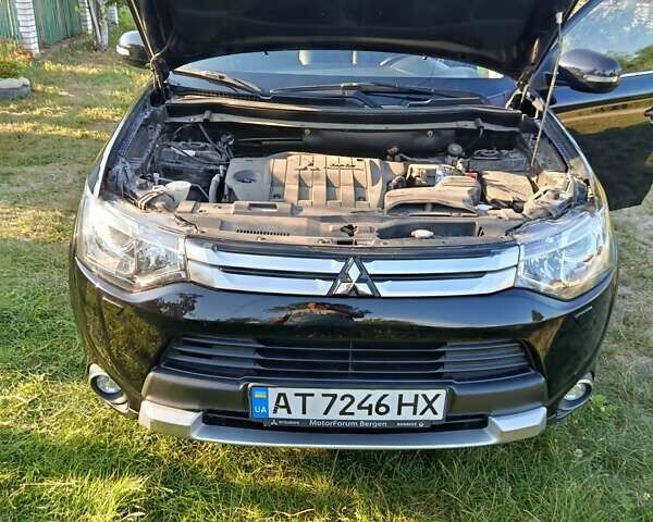 Черный Мицубиси Аутлендер, объемом двигателя 2.27 л и пробегом 260 тыс. км за 14850 $, фото 1 на Automoto.ua