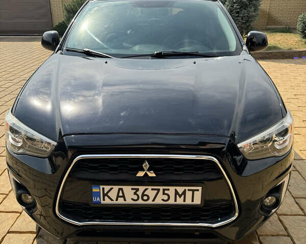 Чорний Міцубісі Аутлендер, об'ємом двигуна 2 л та пробігом 211 тис. км за 9500 $, фото 1 на Automoto.ua