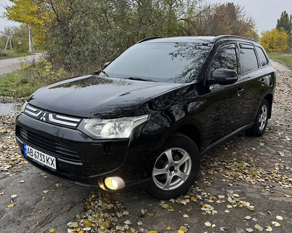 Чорний Міцубісі Аутлендер, об'ємом двигуна 2.4 л та пробігом 277 тис. км за 12800 $, фото 1 на Automoto.ua