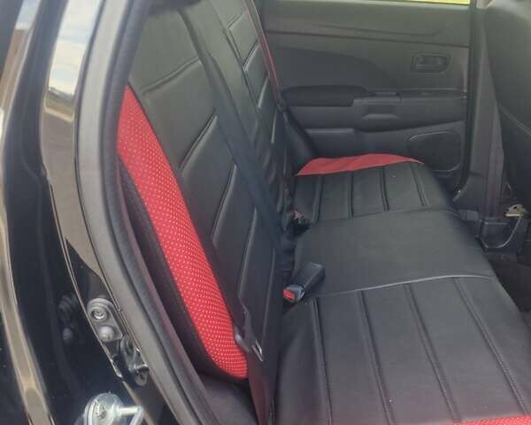 Чорний Міцубісі Аутлендер, об'ємом двигуна 2 л та пробігом 83 тис. км за 13500 $, фото 1 на Automoto.ua