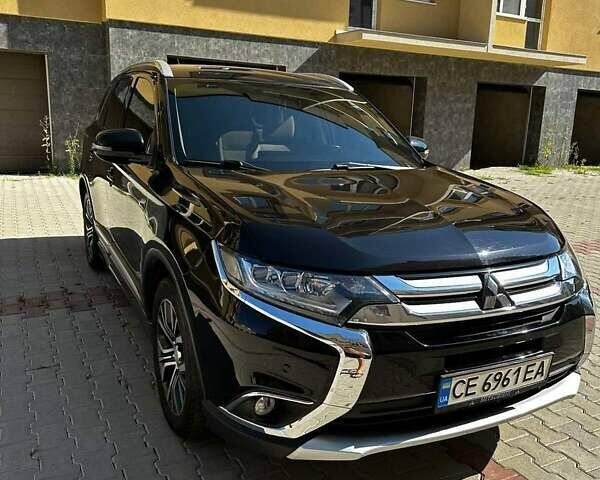 Чорний Міцубісі Аутлендер, об'ємом двигуна 2.36 л та пробігом 225 тис. км за 13699 $, фото 1 на Automoto.ua