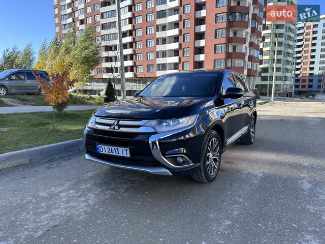 Черный Мицубиси Аутлендер, объемом двигателя 2.36 л и пробегом 150 тыс. км за 14900 $, фото 1 на Automoto.ua