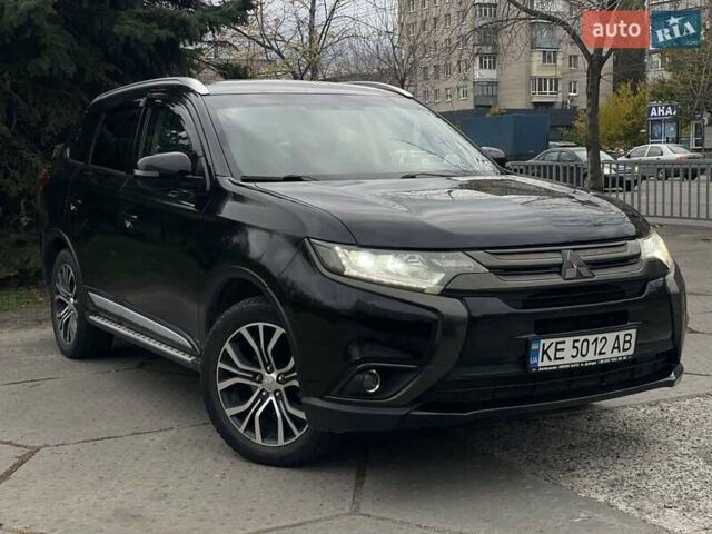 Черный Мицубиси Аутлендер, объемом двигателя 2.36 л и пробегом 167 тыс. км за 13500 $, фото 1 на Automoto.ua