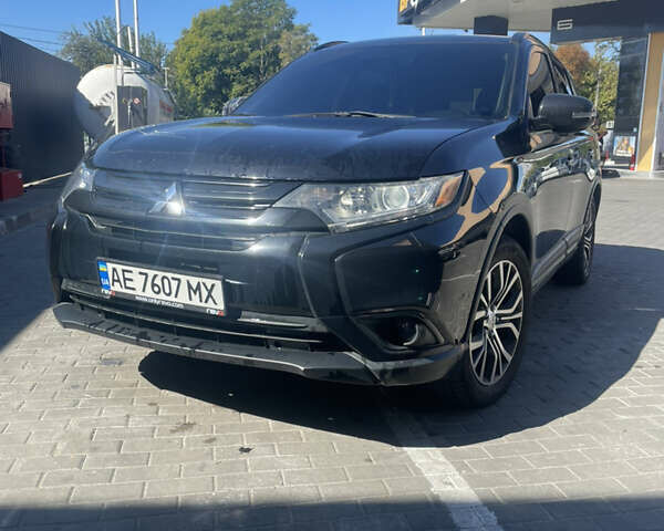 Чорний Міцубісі Аутлендер, об'ємом двигуна 2.36 л та пробігом 190 тис. км за 13500 $, фото 1 на Automoto.ua