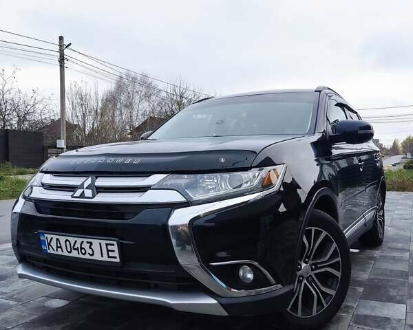 Чорний Міцубісі Аутлендер, об'ємом двигуна 2.36 л та пробігом 213 тис. км за 14500 $, фото 1 на Automoto.ua