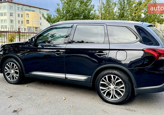 Чорний Міцубісі Аутлендер, об'ємом двигуна 2.36 л та пробігом 154 тис. км за 19500 $, фото 1 на Automoto.ua