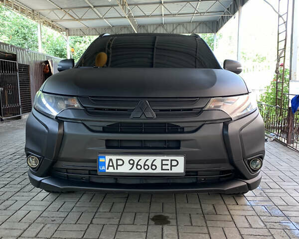 Мицубиси Аутлендер 2016 в Запорожье на Automoto.ua Черный Мицубиси Аутлендер, объемом двигателя 2.36 л и пробегом 197 тыс. км за 16000 $, фото 1 на Automoto.ua