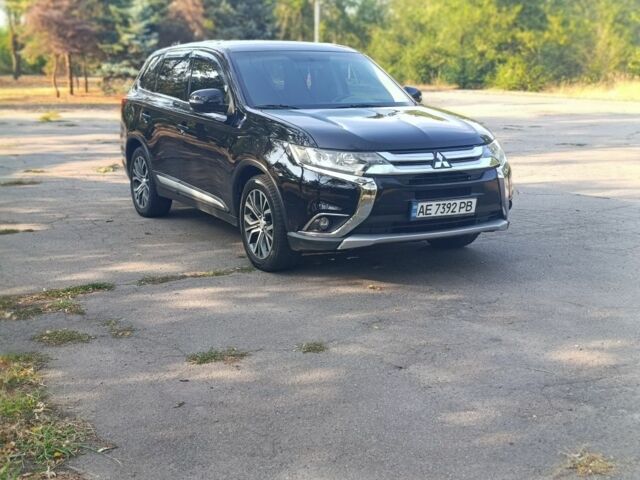 Черный Мицубиси Аутлендер, объемом двигателя 2.4 л и пробегом 156 тыс. км за 330 $, фото 1 на Automoto.ua