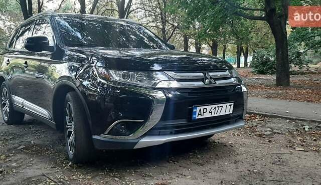 Чорний Міцубісі Аутлендер, об'ємом двигуна 2.36 л та пробігом 123 тис. км за 16000 $, фото 1 на Automoto.ua
