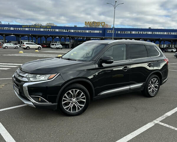 Чорний Міцубісі Аутлендер, об'ємом двигуна 2.36 л та пробігом 166 тис. км за 17100 $, фото 1 на Automoto.ua