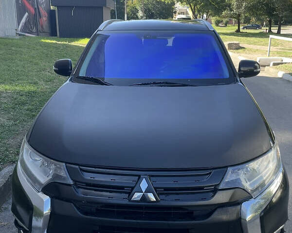 Чорний Міцубісі Аутлендер, об'ємом двигуна 2.36 л та пробігом 150 тис. км за 13500 $, фото 1 на Automoto.ua