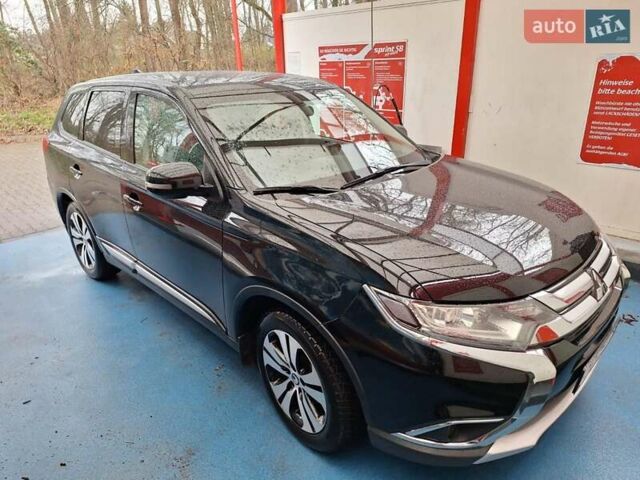 Чорний Міцубісі Аутлендер, об'ємом двигуна 2 л та пробігом 114 тис. км за 17600 $, фото 1 на Automoto.ua