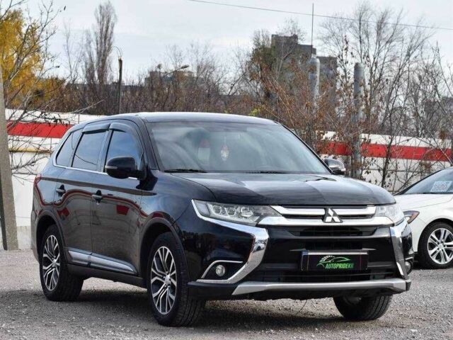 Чорний Міцубісі Аутлендер, об'ємом двигуна 2.4 л та пробігом 154 тис. км за 13499 $, фото 1 на Automoto.ua