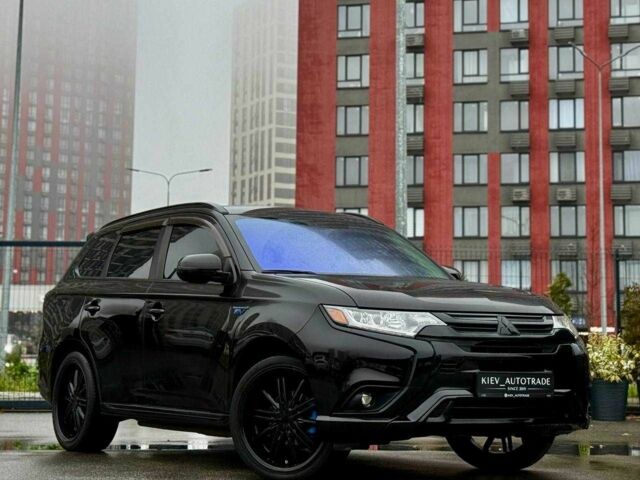 Чорний Міцубісі Аутлендер, об'ємом двигуна 2 л та пробігом 79 тис. км за 22900 $, фото 1 на Automoto.ua