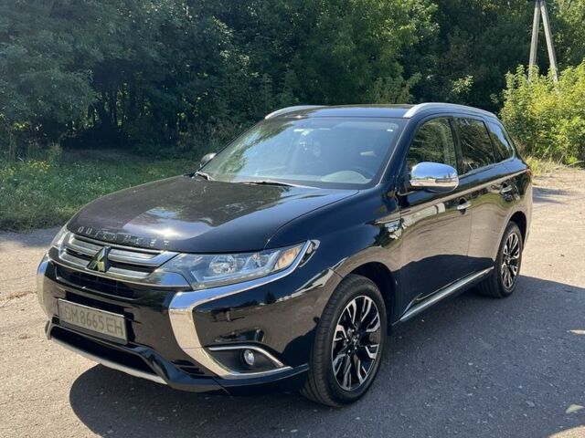 Черный Мицубиси Аутлендер, объемом двигателя 2 л и пробегом 54 тыс. км за 20800 $, фото 1 на Automoto.ua