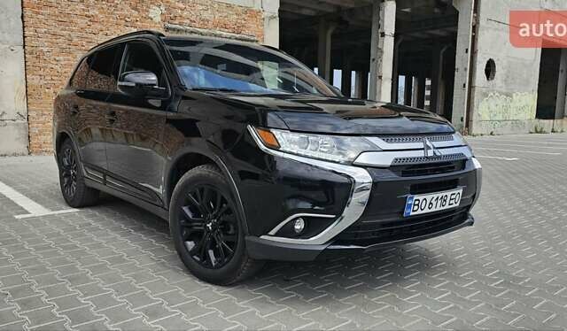 Чорний Міцубісі Аутлендер, об'ємом двигуна 2.4 л та пробігом 81 тис. км за 17100 $, фото 1 на Automoto.ua