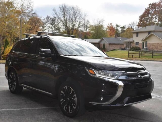 Чорний Міцубісі Аутлендер, об'ємом двигуна 2 л та пробігом 45 тис. км за 14000 $, фото 1 на Automoto.ua