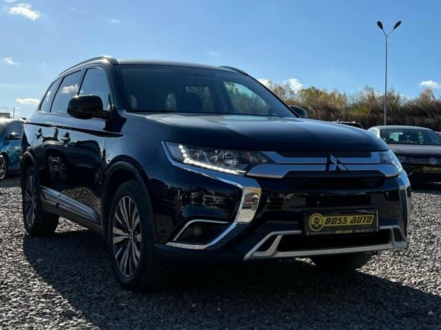 Чорний Міцубісі Аутлендер, об'ємом двигуна 2.4 л та пробігом 97 тис. км за 17700 $, фото 1 на Automoto.ua