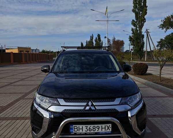Чорний Міцубісі Аутлендер, об'ємом двигуна 2 л та пробігом 86 тис. км за 18000 $, фото 1 на Automoto.ua