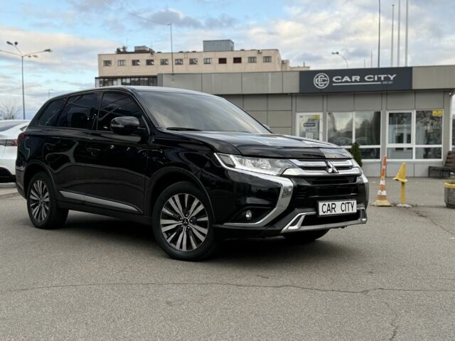 Чорний Міцубісі Аутлендер, об'ємом двигуна 2.4 л та пробігом 107 тис. км за 16250 $, фото 1 на Automoto.ua