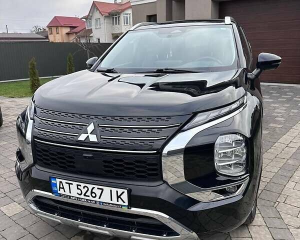 Черный Мицубиси Аутлендер, объемом двигателя 2.49 л и пробегом 69 тыс. км за 25500 $, фото 1 на Automoto.ua