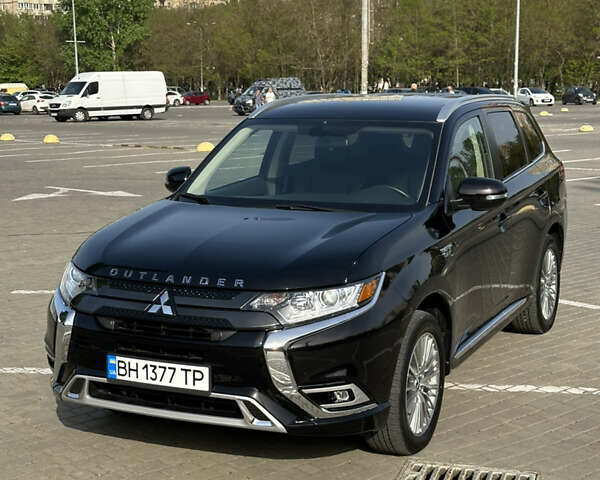 Чорний Міцубісі Аутлендер, об'ємом двигуна 2.36 л та пробігом 30 тис. км за 28100 $, фото 1 на Automoto.ua