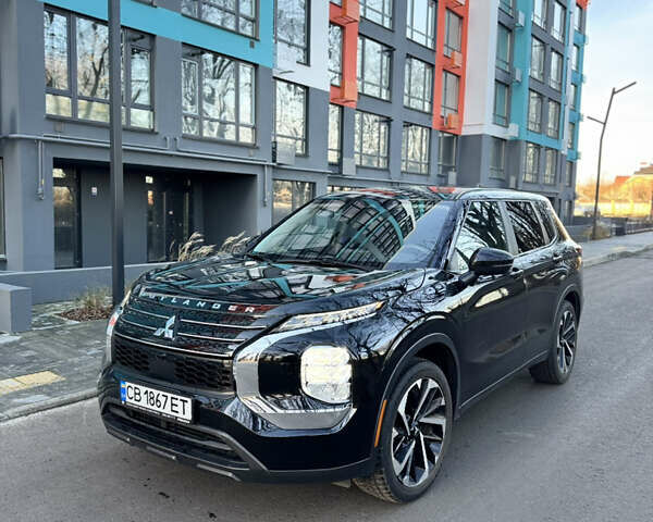 Черный Мицубиси Аутлендер, объемом двигателя 2.49 л и пробегом 56 тыс. км за 25900 $, фото 1 на Automoto.ua