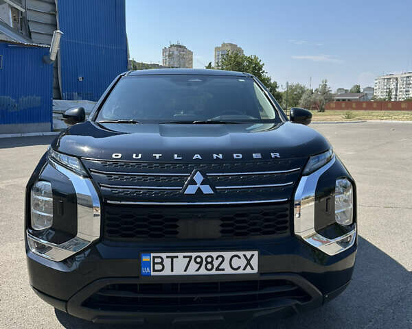Черный Мицубиси Аутлендер, объемом двигателя 2.49 л и пробегом 160 тыс. км за 23000 $, фото 1 на Automoto.ua