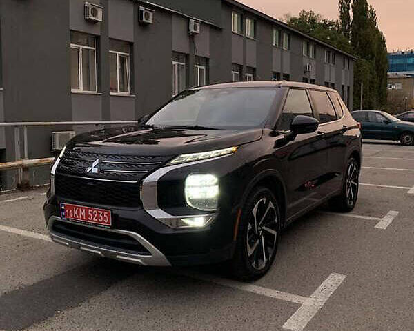 Черный Мицубиси Аутлендер, объемом двигателя 2.49 л и пробегом 70 тыс. км за 21000 $, фото 1 на Automoto.ua