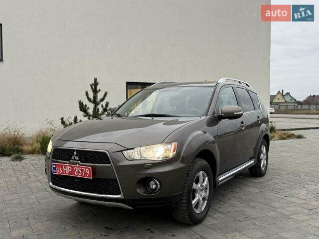 Коричневий Міцубісі Аутлендер, об'ємом двигуна 2.2 л та пробігом 235 тис. км за 10600 $, фото 1 на Automoto.ua