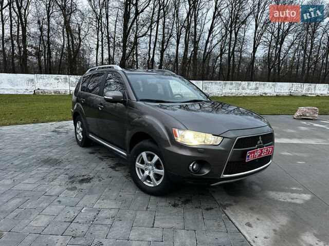 Коричневий Міцубісі Аутлендер, об'ємом двигуна 2.2 л та пробігом 235 тис. км за 10500 $, фото 1 на Automoto.ua