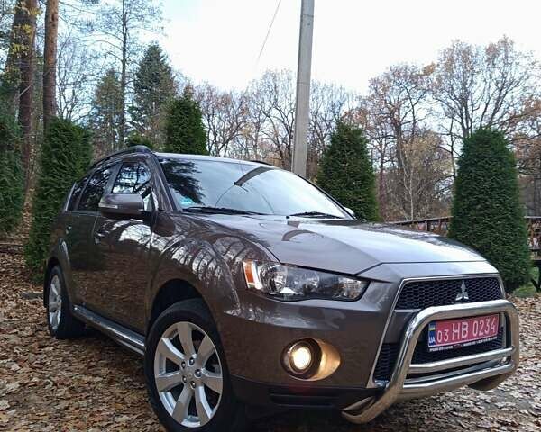 Коричневый Мицубиси Аутлендер, объемом двигателя 2.2 л и пробегом 155 тыс. км за 11350 $, фото 1 на Automoto.ua